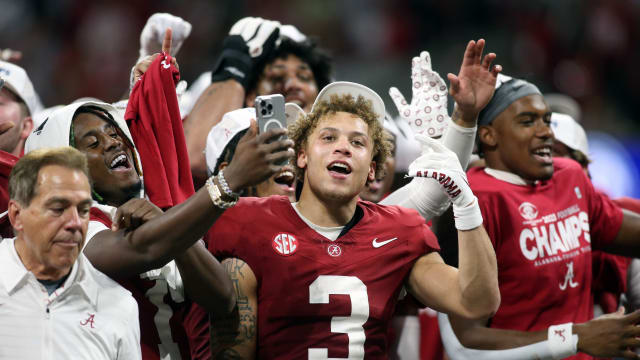 Dec 2, 2023; Atlanta, GA, USA; Alabama Crimson Tide wide receiver Jermaine Burton (3) celebrates with teammates on the podium after defeating the Georgia Bulldogs in the SEC championship game at Mercedes-Benz Stadium.